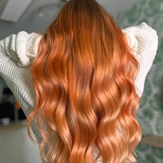 copper glow haircolor This soft amber and ginger tone adds natural brightness and dimension using balayage and glossing. A flattering glow-up for cooler days.