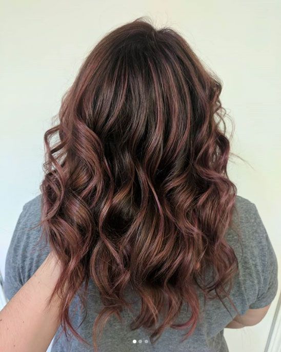 rosewood brunnette Rose or violet undertones meet rich brunette bases for a subtle, iridescent pop. It’s elevated, modern, and completely unique.